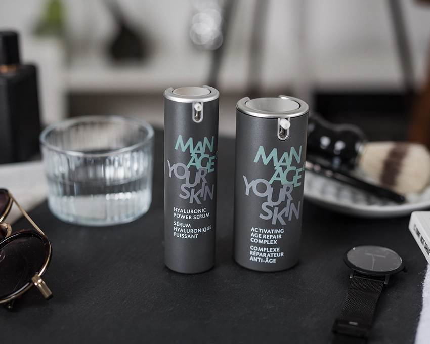Herren Gesichtsserum & Creme auf dem Tisch stillvoll platziert