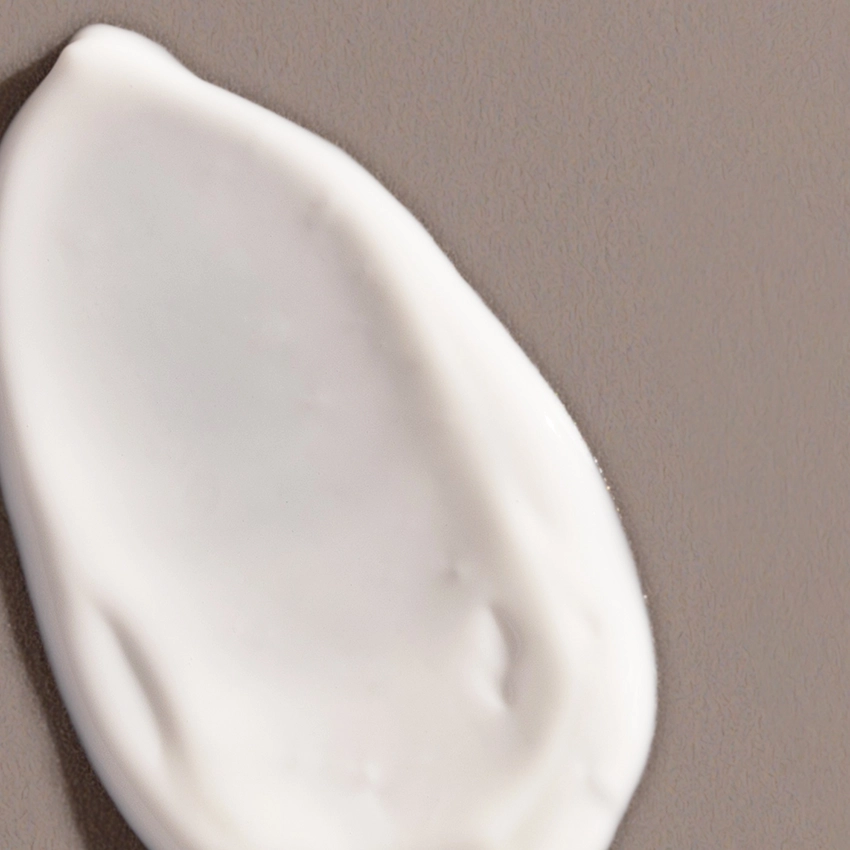 Nahaufnahme Textur - Daily Moisturizing Fluid weiße Cremetextur