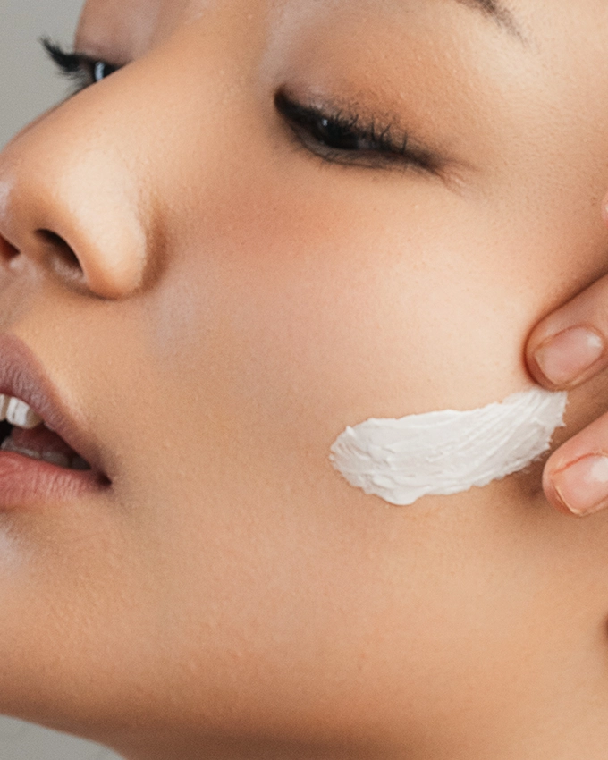 Face care application on the cheek